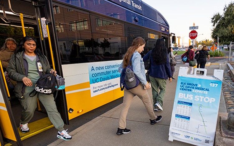 Bus stop at UC Davis with signage